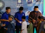 Anggota DPRD Muaro Jambi Robinson Sirait saat menyalurkan santunan ke panti