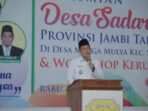 Wabup BBS menyampaikan kata sambutan dalam acara peresmian Desa Sadar Kerukunan.