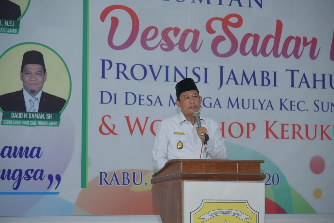 Wabup BBS menyampaikan kata sambutan dalam acara peresmian Desa Sadar Kerukunan.