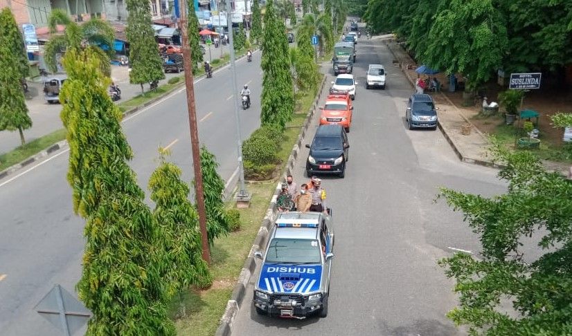 Tim Satgas Covid-19 Berkeliling Kota Bangko Ingatkan Protokol Kesehatan.