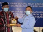 Proses acara serah terima hibah barang milik daerah di swiss bell hotel Kota Jambi
