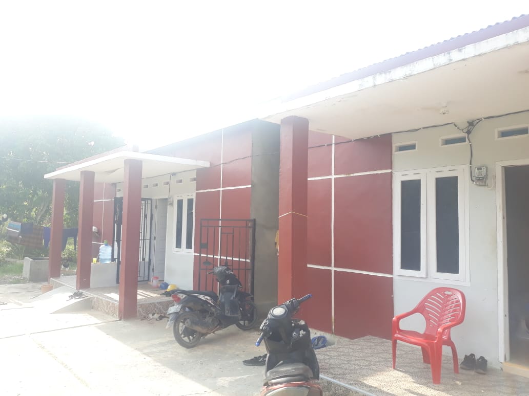 Rumah Kasat Pol PP Muaro Jambi yang mendapat bantuan program SPAM di Desa Simpang Sungaiduren.