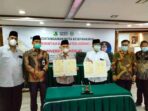 Rektor UNAND Prof Dr Yuliandri SH MH dengan Bupati Kerinci Dr H Adirozal Msi tandatangani MoU.