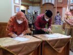 penandatanganan berita acara serah terima LHP LKPD Muaro Jambi TA 2020.