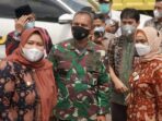 Bupati Masnah saat mendampingi Pj Gubernur meninjau pelaksanaan PSU Pilgub Jambi.