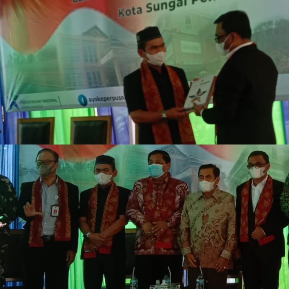 Ketua DPRD Sungai Penuh H.Fajran saat menghadiri acara peresmian gedung perpusatakaan.