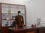 Sekretaris Daerah (Sekda) Provinsi Jambi H. Sudirman, S.H., M.H., mengikuti Rakor secara virtual