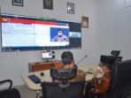 Wabup Batanghari saat mengikuti Zoom Meeting dengan Dirjend Bina Adwil Kemendagri secara virtual.