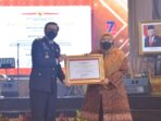 Bupati Muaro Jambi menerima penghargaan sebagai kabupaten/kota selaku Mitra Kerja Kantor Hukum dan HAM