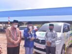Acara penyerahan bantuan satu unit mobil layanan ummat dari NU Ranting Cabang Bahar Selatan kepada warga Desa Tanjung Mulia.
