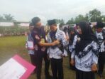 Peringatan Hari Guru dan HUT PGRI ke-77 di Desa Pulau Mentaro, Kecamatan Kumpeh, Kabupaten Muaro Jambi.
